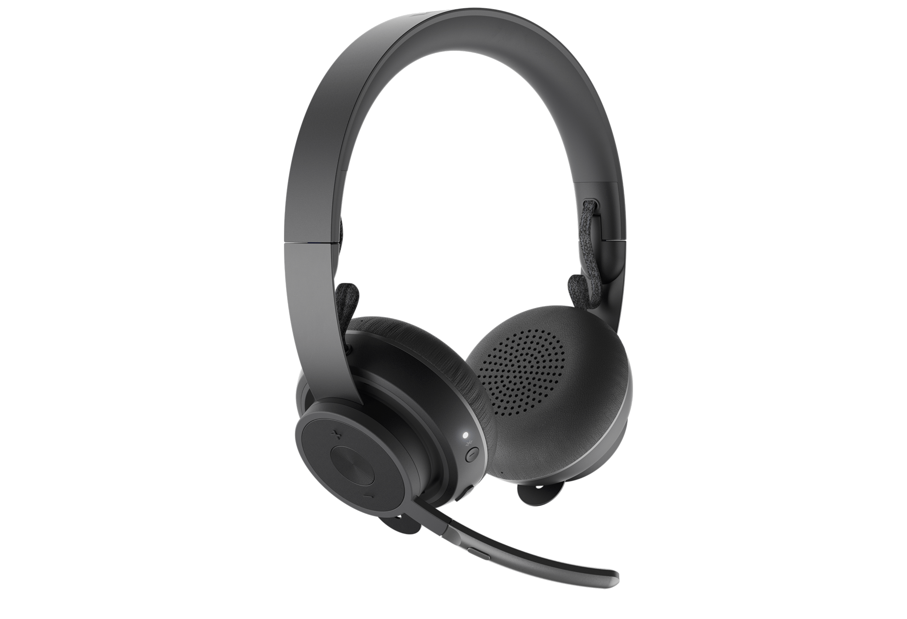 Logitech H820e Wireless You can tell from the plain cardboard box that the H820e business Bluetooth headset comes in that it is not designed to be sold to the end user. It is rather an enterprise-focused product, and we can certainly see why. Let us go through the features of this truly fantastic headset in a scenario where it feels at home the most: It’s 9:30 AM in X call center. Steve has just had his coffee and is ready to start with the cold calls of the day. Before that though, the H820e dock next to his computer lights up to let him know that he has an incoming call. He puts on the headset, adjusts the boom mic and unmutes it with the button right on the mic and listens to his boss talk about the agenda for the day. Steve then starts his first cold call. It’s with one of those clients who has the microphone inside his mouth. But Steve doesn’t wince at his sound because the H820e already filters out all the crackles and hisses that go beyond 115dBA. He just gently lowers the volume with the controls right on the right ear cup. Janet wants to ask Steve if he could lend her some of his Brazilian coffee, but she hesitates and turns back as she sees the red light at the back of the boom mic on Steve’s H820e, indicating that he’s on a call. After an hour of cold calling, Steve is feeling a bit cramped so he starts walking upstairs back to the kitchen, all the while not dropping his call because the connection that his headset is making with the dock isn’t limited to 10 meters. Steve can be around 100 meters away from the dock and still not skip a beat in the call! It is 5 P.M. and Steve just took off the headset for the first time and popped it on the dock to be charged for another day of use tomorrow. He would have been fine to use it for at least another 5 hours!